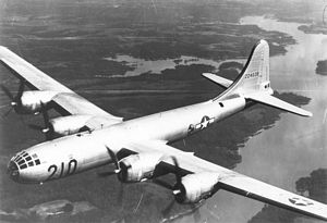B-29 Superfortress flying over lake