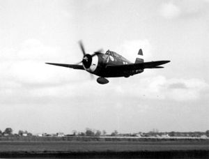P-47D in low flight with drop tanks