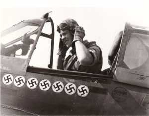 Roy Whittaker in cockpit of P-40