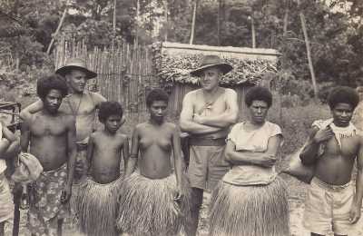 Papuan women wearing grass skirts