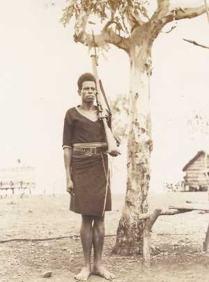 Papuan with rifle