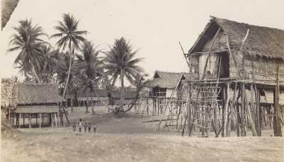 tall stilt houses on land