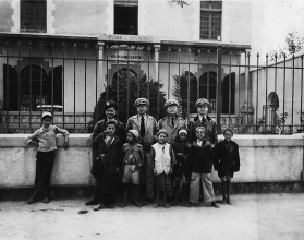 Oran, officers and local kids