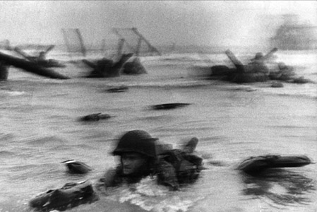 Robert Capa's blurry image of soldier going ashore on D-Day