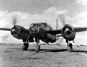 Douglas A-26C, on grassy airfield, engines running