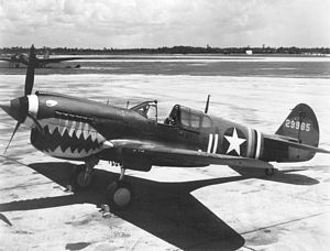 Curtiss P-40 with shark mouth on runway