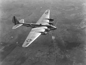 XB-15 with red dot roundels, in flight
