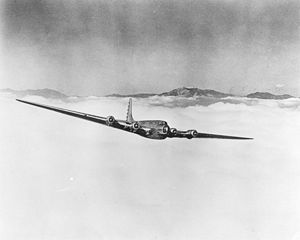 XB-19 Soars over the Clouds